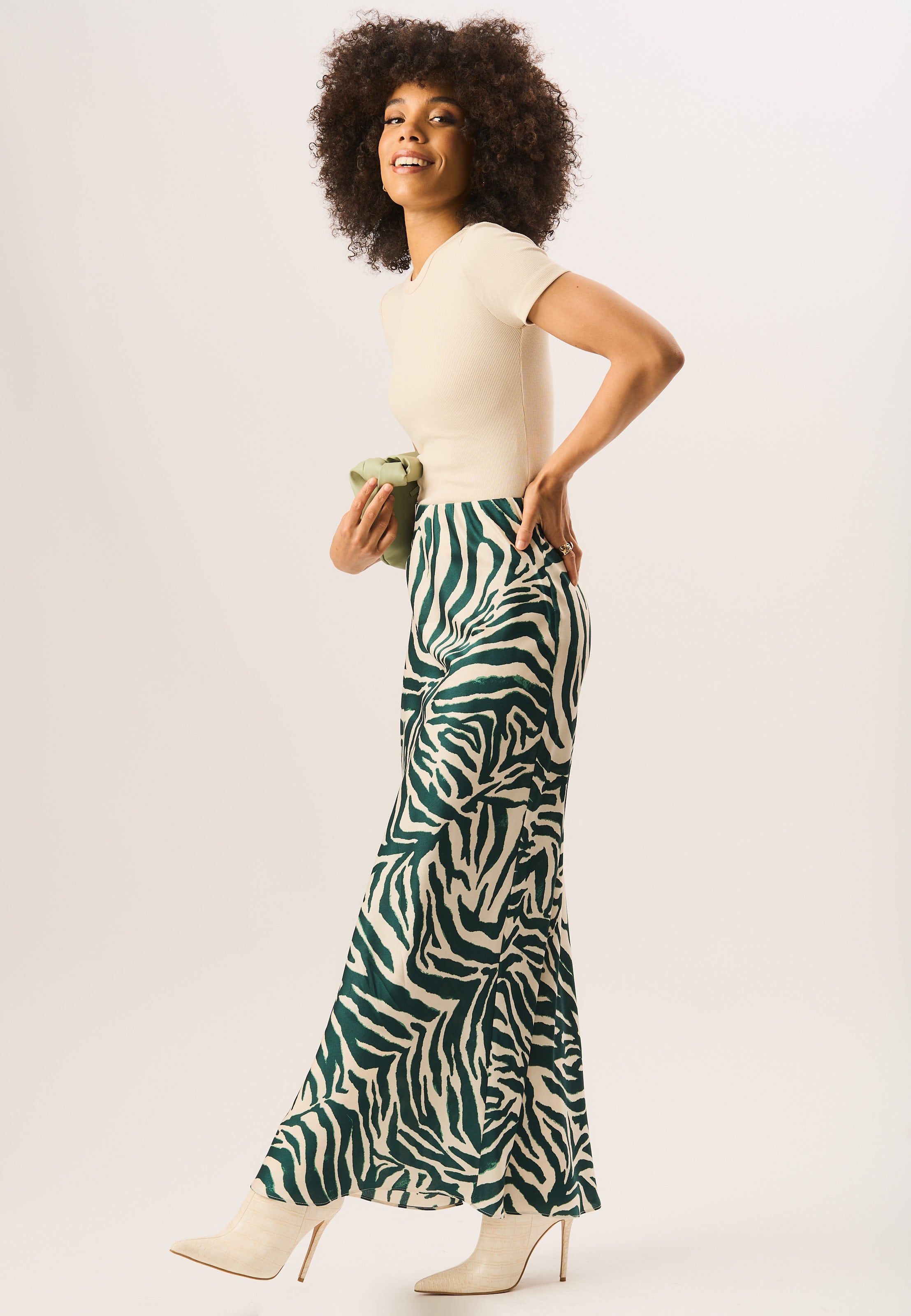The Arabella Bias-Cut Maxi Skirt in striped olive green